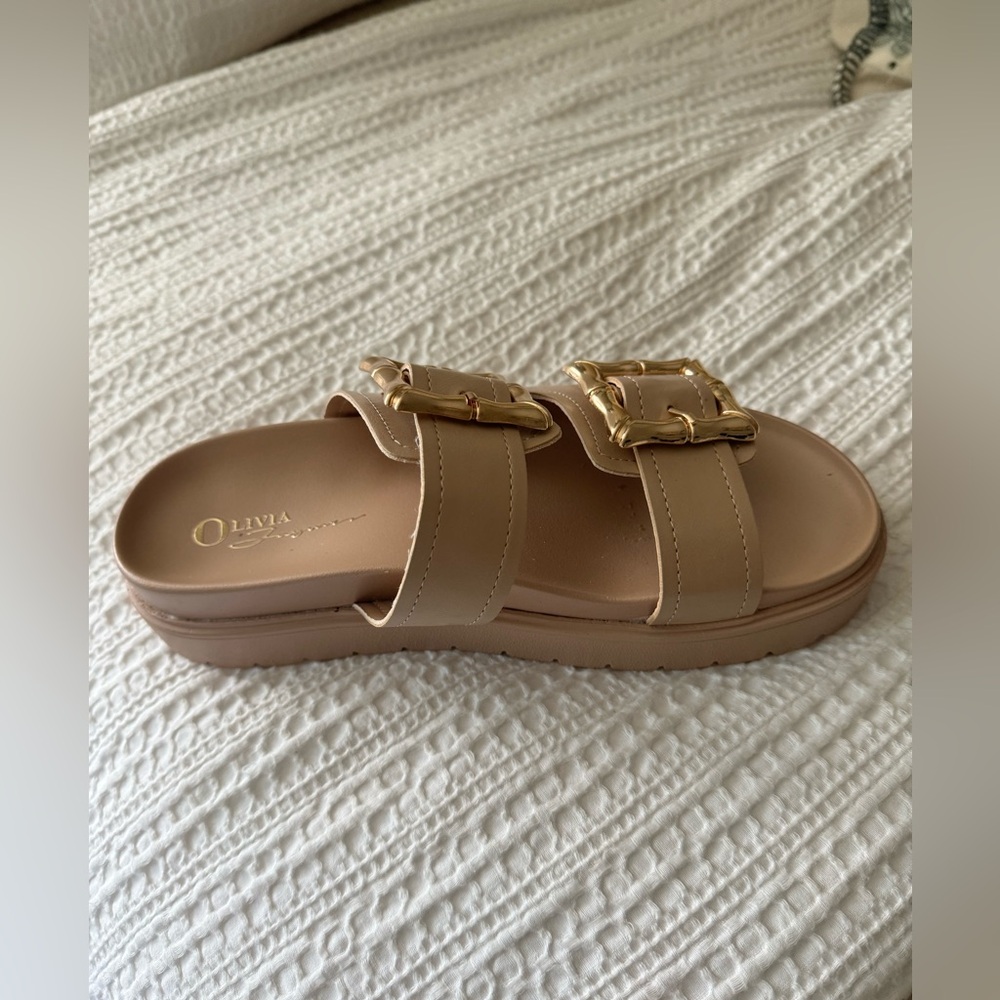 Ladies platform, gold buckle sandals.